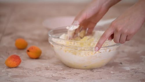 Hands Mixing Flour and Butter for Dough