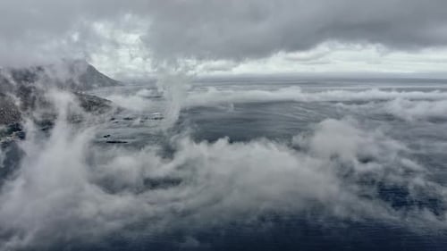 Thick Fog in the Foreground and a Glimpse of the Sea Behind It