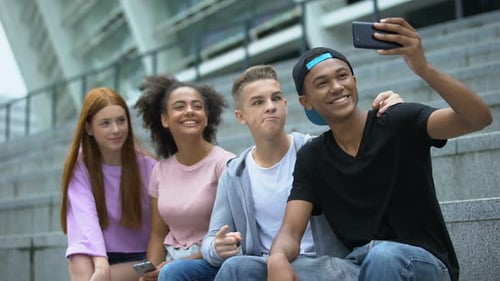 Friends Taking Selfie Together in Urban Environment