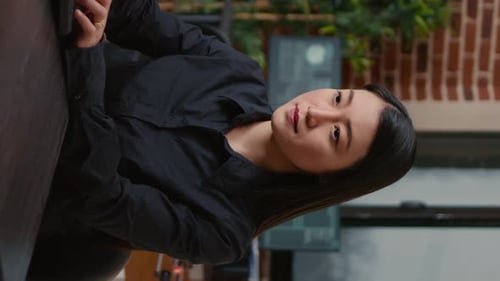 Vertical Video Smiling Software Developer Typing Machine Learning App Code on Computer Keyboard