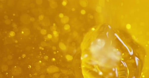 Fresh Honey Slowly Drains. Macro Background.