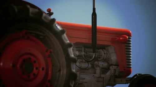 Animated Close-Up of a Modern Red Tractor