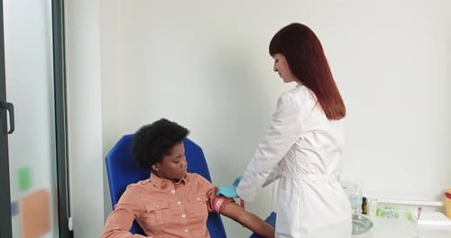 Medical Staff and Patient Give Thumbs Up
