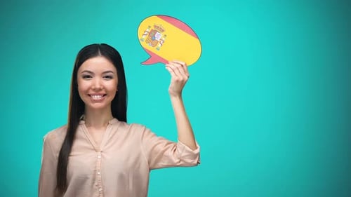 Smiling Woman Holding Spain Flag Speech Bubble