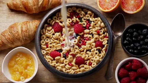 Healthy Cereal Breakfast with Fruit and Croissants