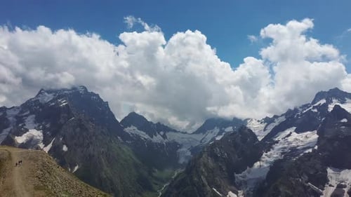 Mountain Peaks in the Snow on a Cloudy Day. Breathtaking View of Mountains.