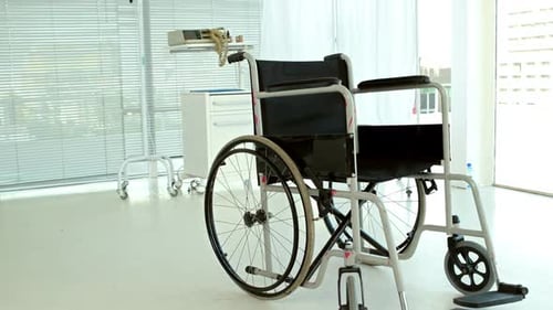 Empty Wheelchair in Bright Modern Hospital Setting