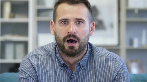 Portrait of Amazed, Surprised Adult Man Wondering