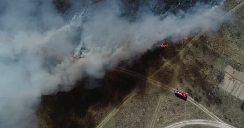 Fire Truck And Big Fire In The Field