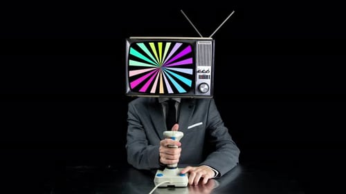Man with TV Head Plays Retro Video Game