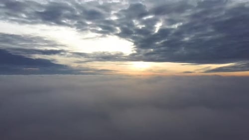Aerial View of Clouds at Sunset