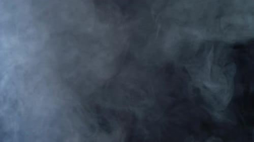 Billowing White Smoke on Black Background