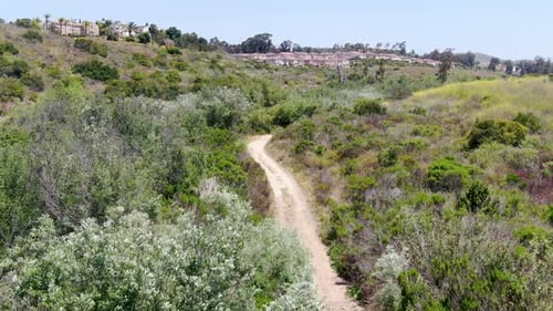 Aerial View of a Small Singletrack Trail in Green Valley