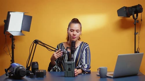 Woman Records Video in Brightly Lit Home Studio