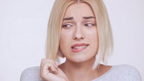 Blonde Woman with Bob Posing and Smiling