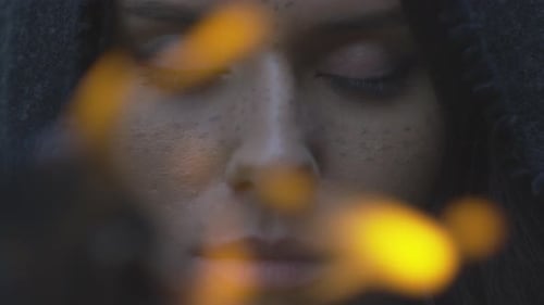 Dramatic Close Up of Woman's Face with Fire