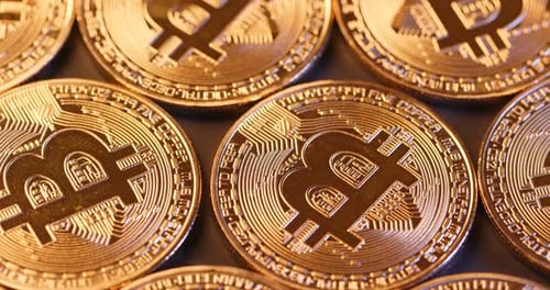 Macro Shot of Golden Bitcoin Crypto Currency Coins