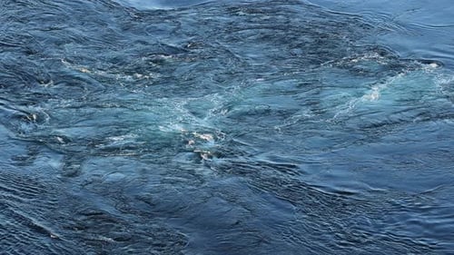 Waves of Water of the River and the Sea Meet Each Other During High Tide and Low Tide