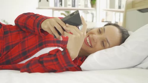Relax happy latin young businesswoman. People using a smartphone on social media online