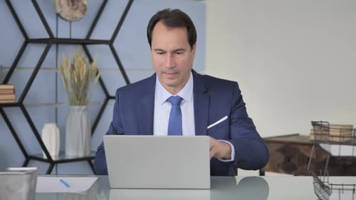Businessman Leaving Office