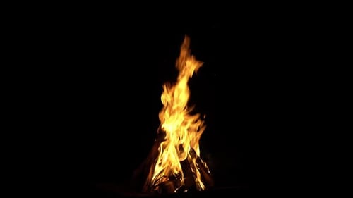 Feuerflamme Isolierter schwarzer isolierter Hintergrund Schöne gelbe Orange