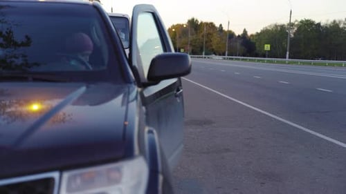 Woman On The Road With Car Wearing Face Mask To Protect Against Virus Covid 19