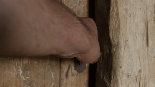 Trying to break rusty lock handle 4K 2160p 30fps UlraHD footage - Abandoned house doors close-up 3