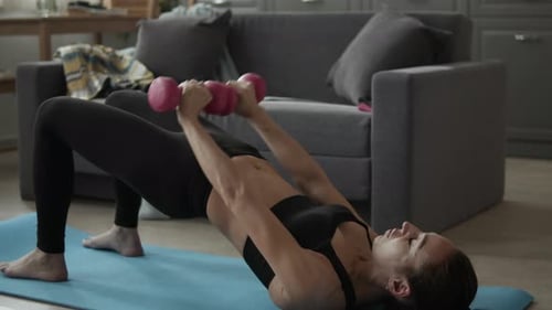Woman working out at home