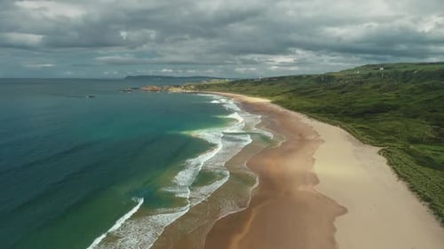 Hyperlapse Aerial View: White Beach Gulf Water Crashing. People Walking and Playing with Dogs