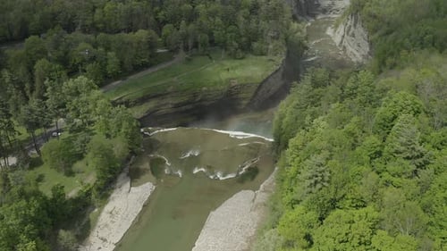Lush Green Canyon with River Aerial View