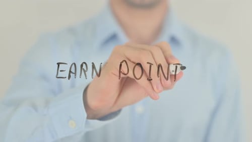 Man Writes the Words 'Earn Points'