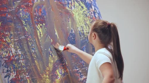 Child Painting Abstract Art on Large Canvas