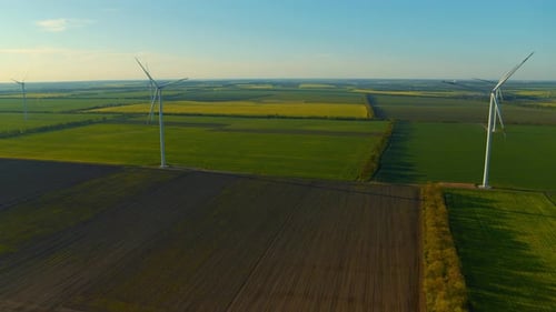 View of Wind Generators Producing Clean Alternative Energy in Rural Landscape