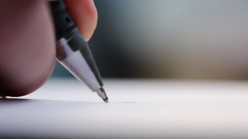 Man Signs With A Ballpoint Pen On A White Sheet Of Paper. Important Records. Office Work.