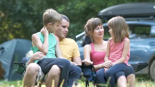 Loving Family Relaxing Together in Nature