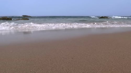 Surfen am Sandstrand