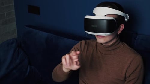 Man Wearing VR Headset Interacting Virtually