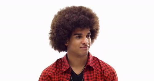 Smiling Young Man Looks Up in Close Up