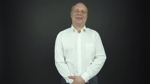 Man Smiling in Studio Portrait