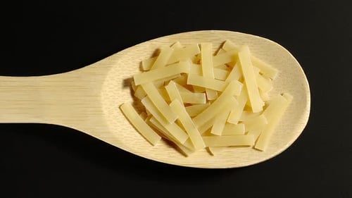 Dry Rectangular Pasta Pieces Filling Wooden Spoon