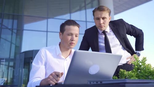 Colleagues running business.