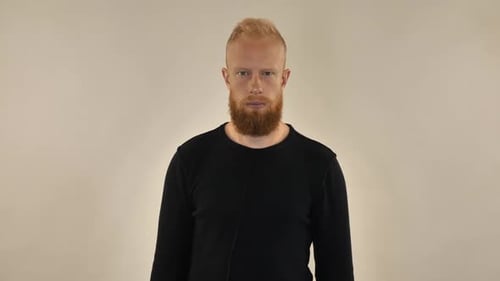 Man Making Stop Gesture With Hand