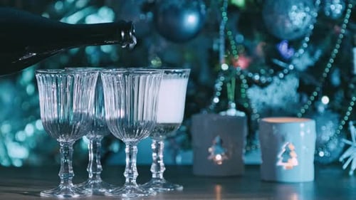 Champagne Pouring into Glasses at Christmas