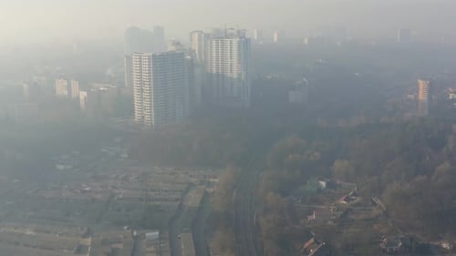 Aerial View of Smog or Fog Hanging Over the City. Air Environmental Pollution Concept