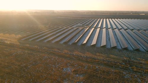 Close Up Drone View of Solar Panels Stand in a Row in the Fields Power Ecology Innovation Nature