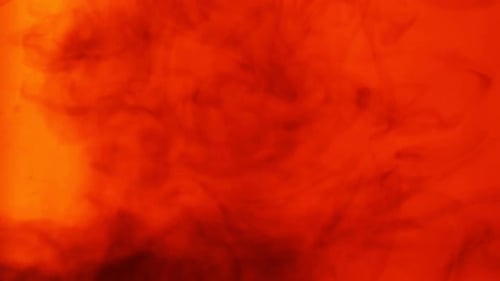 Dark Ink Plume in Bright Orange Liquid