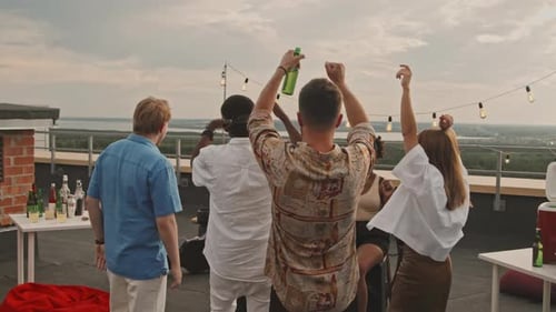 People Partying on Rooftop Terrace