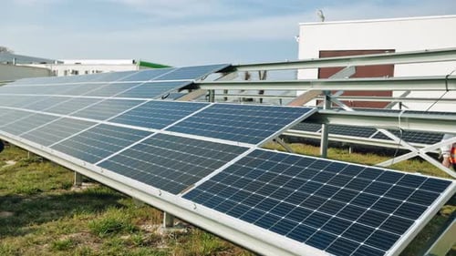 Installing Of Solar Cell. Male technician installing photovoltaic solar modules