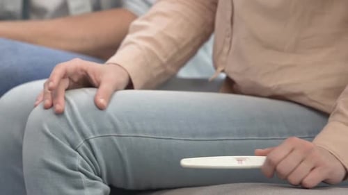 Nervous Female Showing to Boyfriend Positive Test, Unwanted Pregnancy Problem