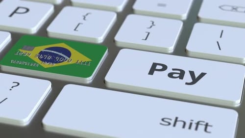Brazilian Credit Card and Pay Button on Computer Keyboard